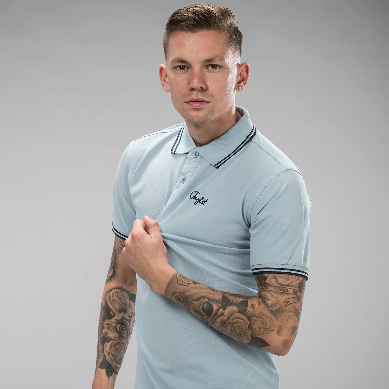 Sky Blue Jnglst Polo Shirt with Navy Detailing