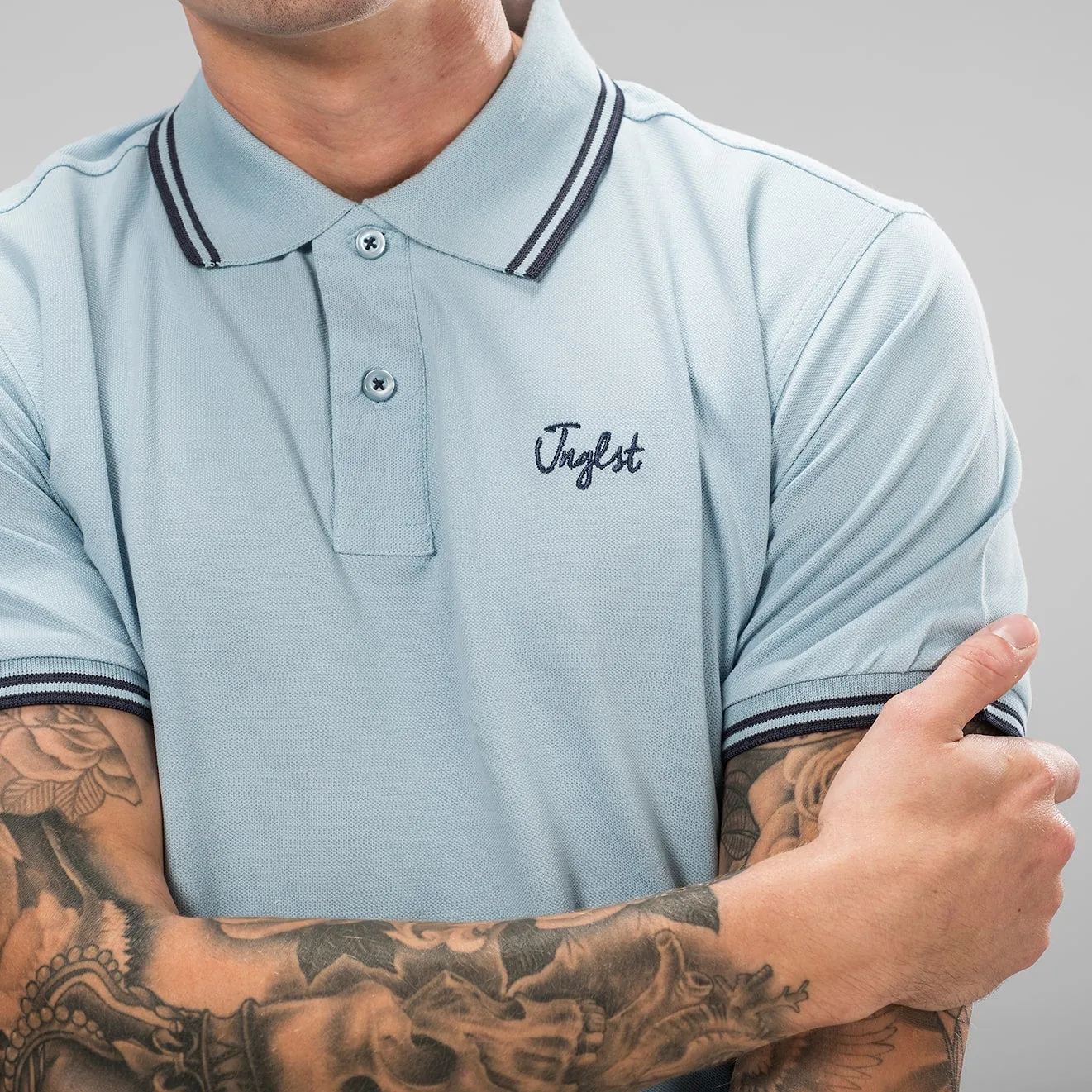 Sky Blue Jnglst Polo Shirt with Navy Detailing